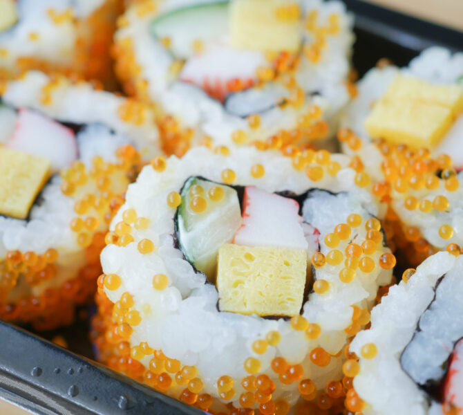 detail shot of Sushi roll with salmon, shrimps and avocado ,